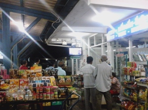 Watching Soccer with the locals and other tourists while waiting for night train.